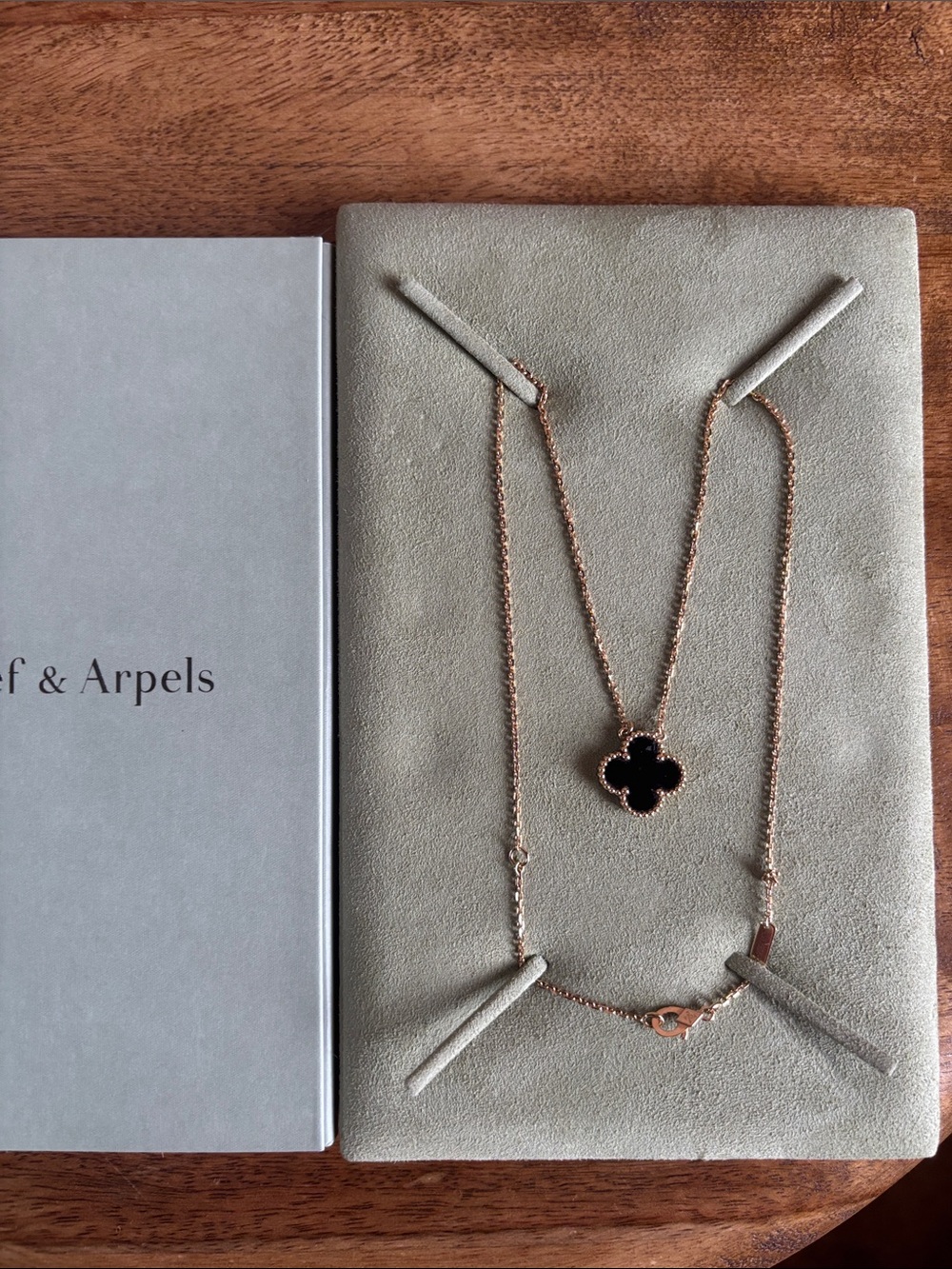 Van Cleef & Arpels Yellow Gold, Onyx Alhambra Pendant.